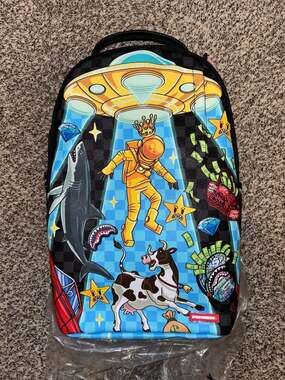 Sprayground Space Warped RMX DLXSV Backpack. NWT. Full size